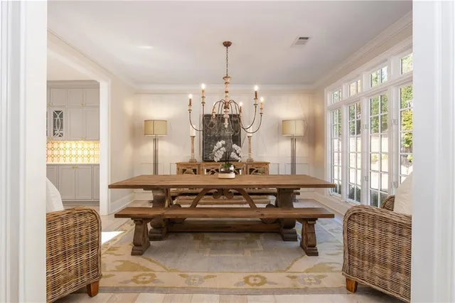 a bathroom with a granite countertop shower a sink and a mirror