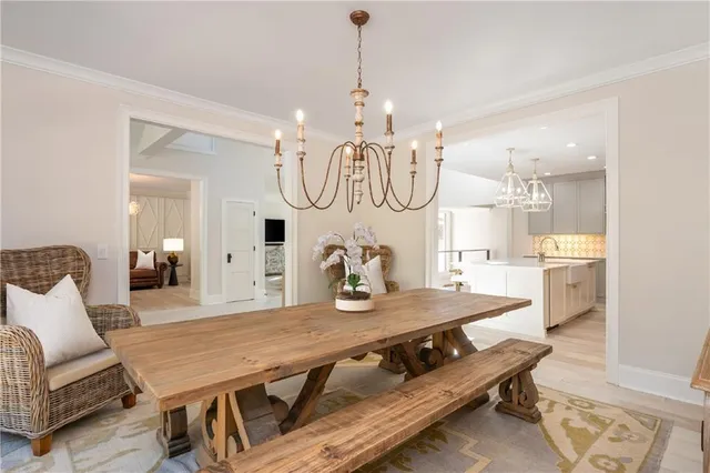 a building outdoor space with patio furniture and garden