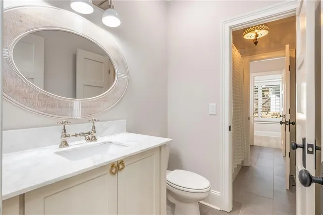 a large white bed in a white room