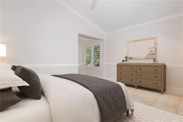 a bathroom with a bathtub sink and mirror