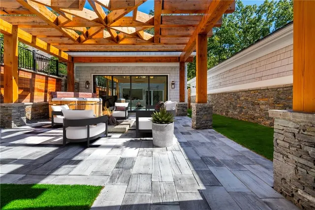 a view of a chairs and table in the patio