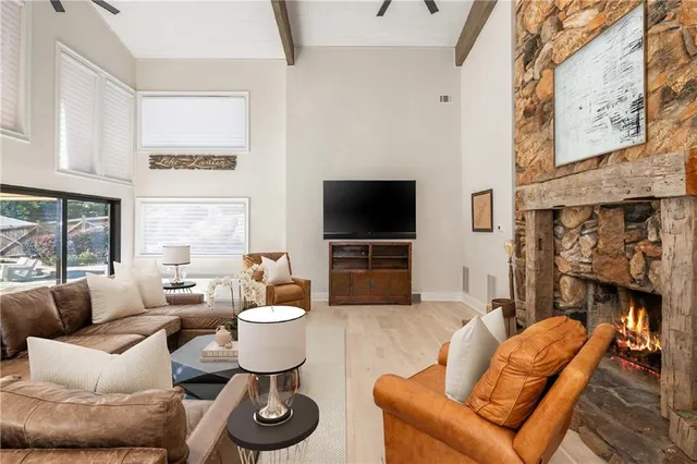 a house with swimming pool in front of it