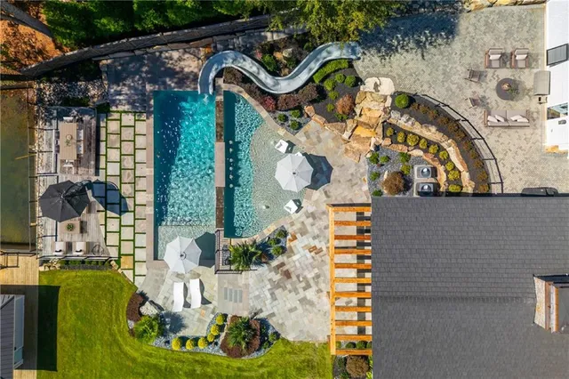 a kitchen with a table and chairs