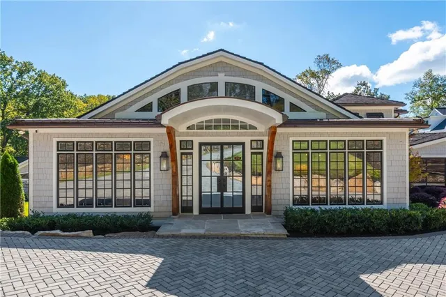 a kitchen with stainless steel appliances granite countertop a stove and a refrigerator