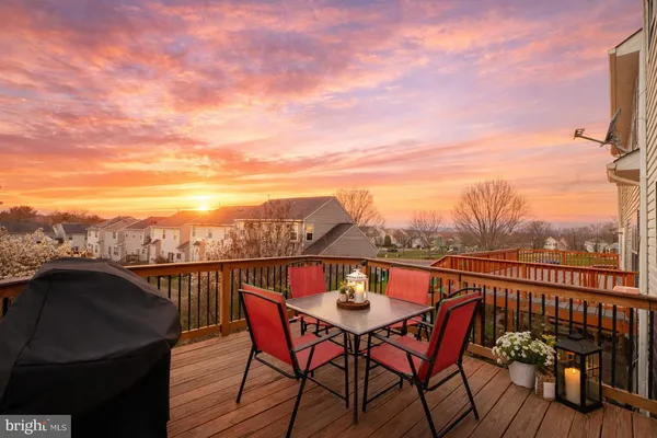 a view of a chairs and table on the terrace