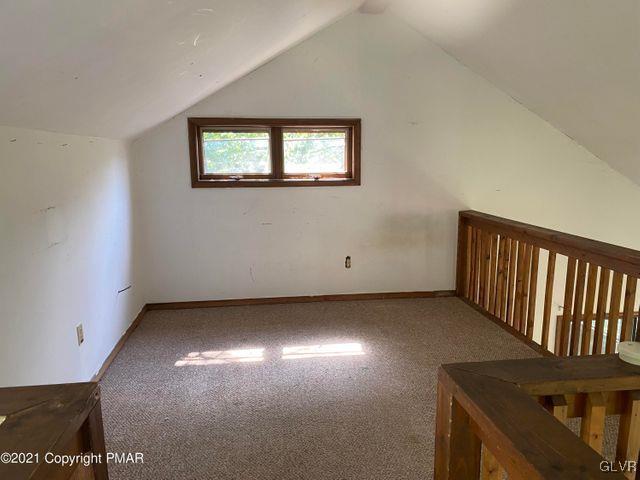 1045 Hampstead Road Bushkill, PA 18324 - Photo 9 of 14 an empty room with windows
