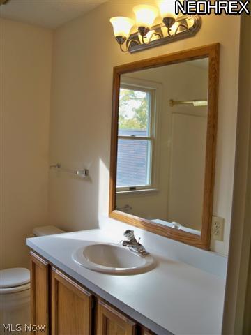 1938 Lillian Road Stow, OH 44224 - Photo 16 of 22 Second full bath on second floor has new vanity lights.