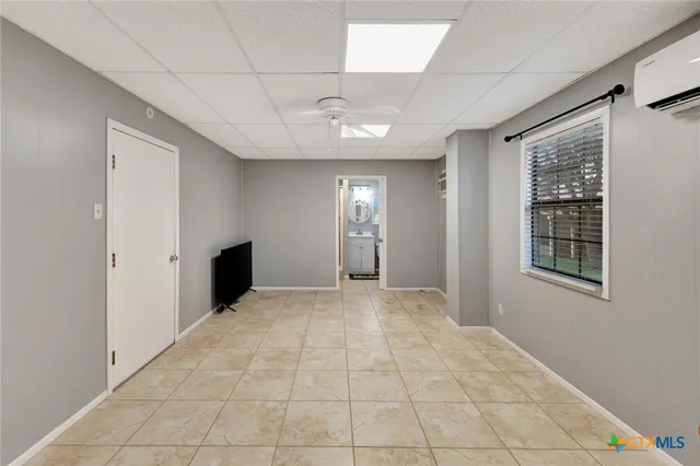 a bathroom with a toilet and a sink