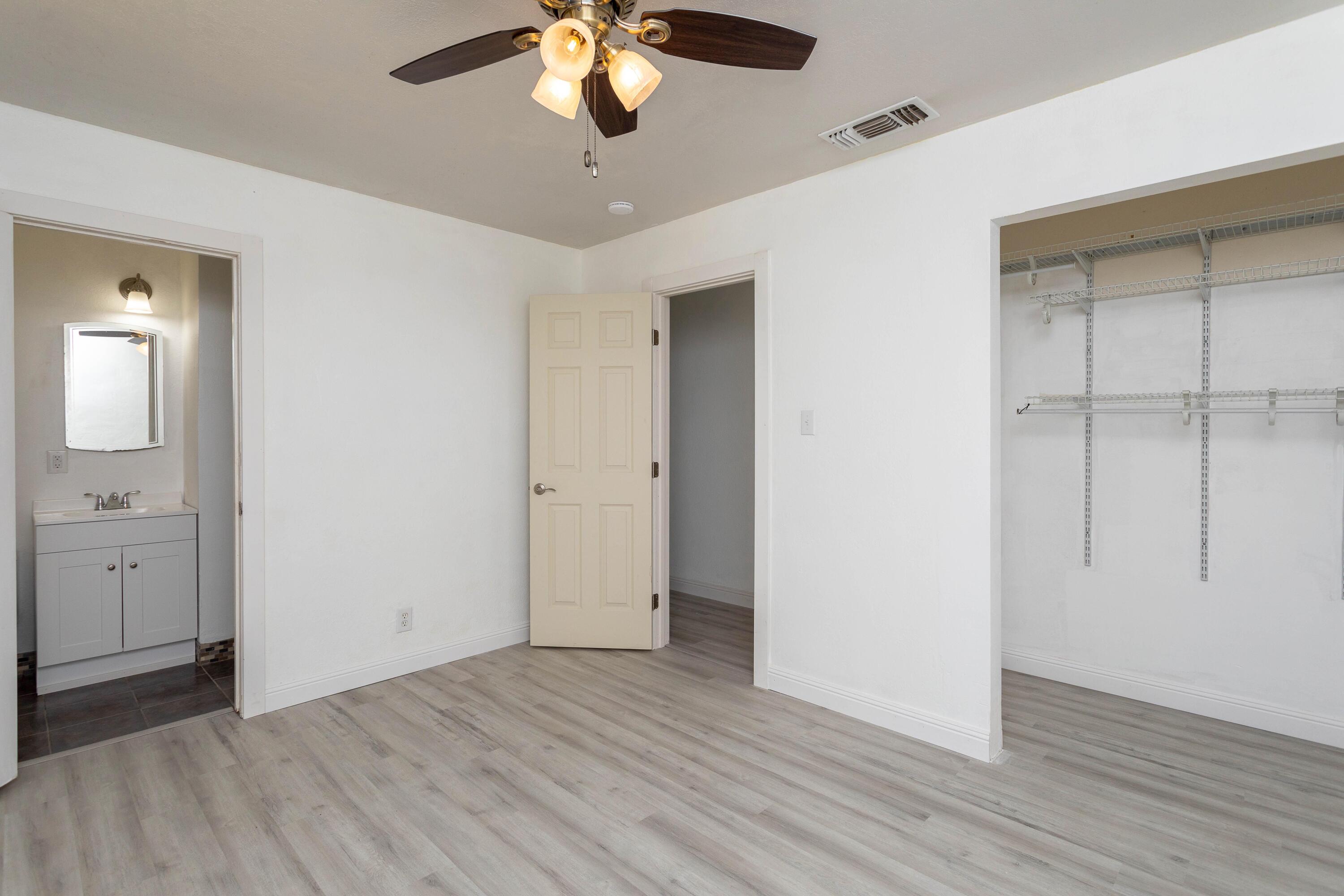 2943 Kenco Avenue Redding, CA 96002 - Photo 11 of 19 a view of an empty room with wooden floor