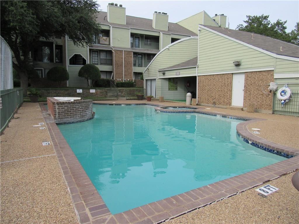6108 Abrams Road, Unit 613 Dallas, TX 75231 - Photo 14 of 27 a front view of a house with garden