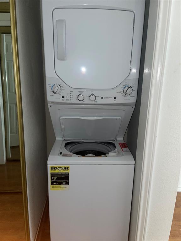 6108 Abrams Road, Unit 613 Dallas, TX 75231 - Photo 15 of 27 a utility room with dryer and washer