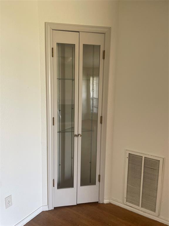 6108 Abrams Road, Unit 613 Dallas, TX 75231 - Photo 20 of 27 a view of a bathroom with a glass door