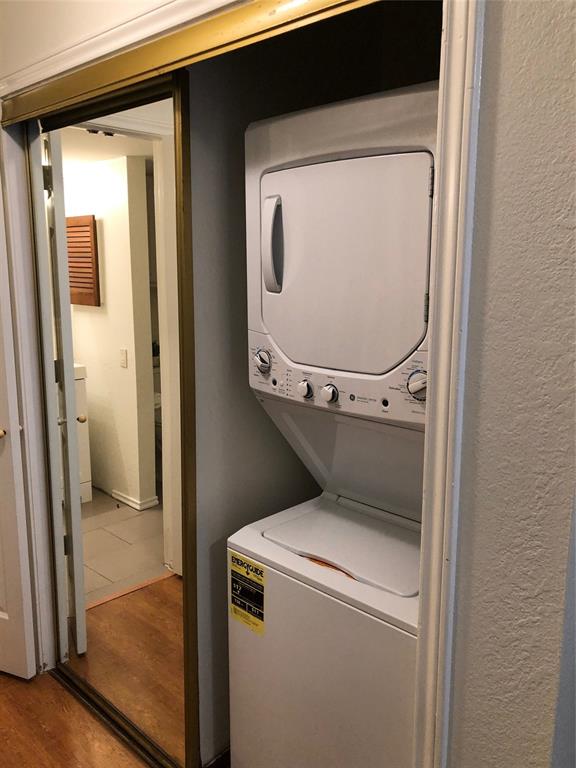 6108 Abrams Road, Unit 613 Dallas, TX 75231 - Photo 24 of 27 a utility room with dryer and washer