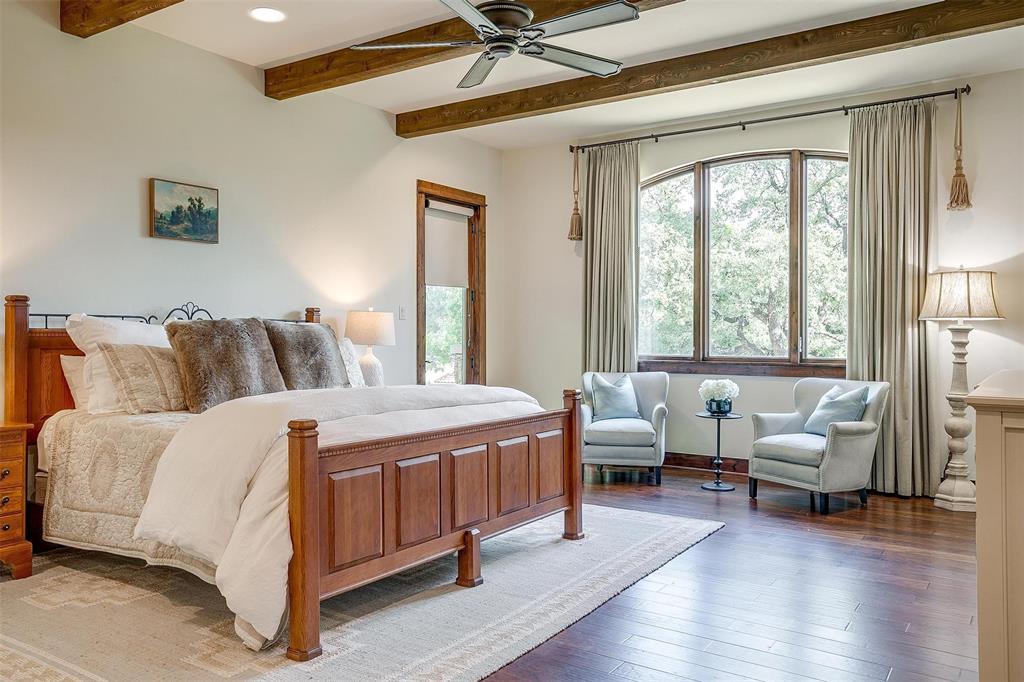 9930 Boat Club Road Fort Worth, TX 76179 - Photo 16 of 40 a bedroom with a bed and a couch