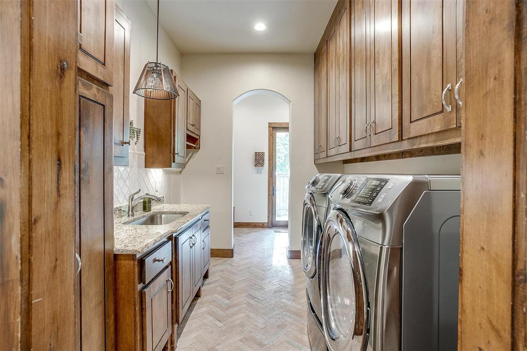 9930 Boat Club Road Fort Worth, TX 76179 - Photo 20 of 40 a utility room with mirror washer and dryer
