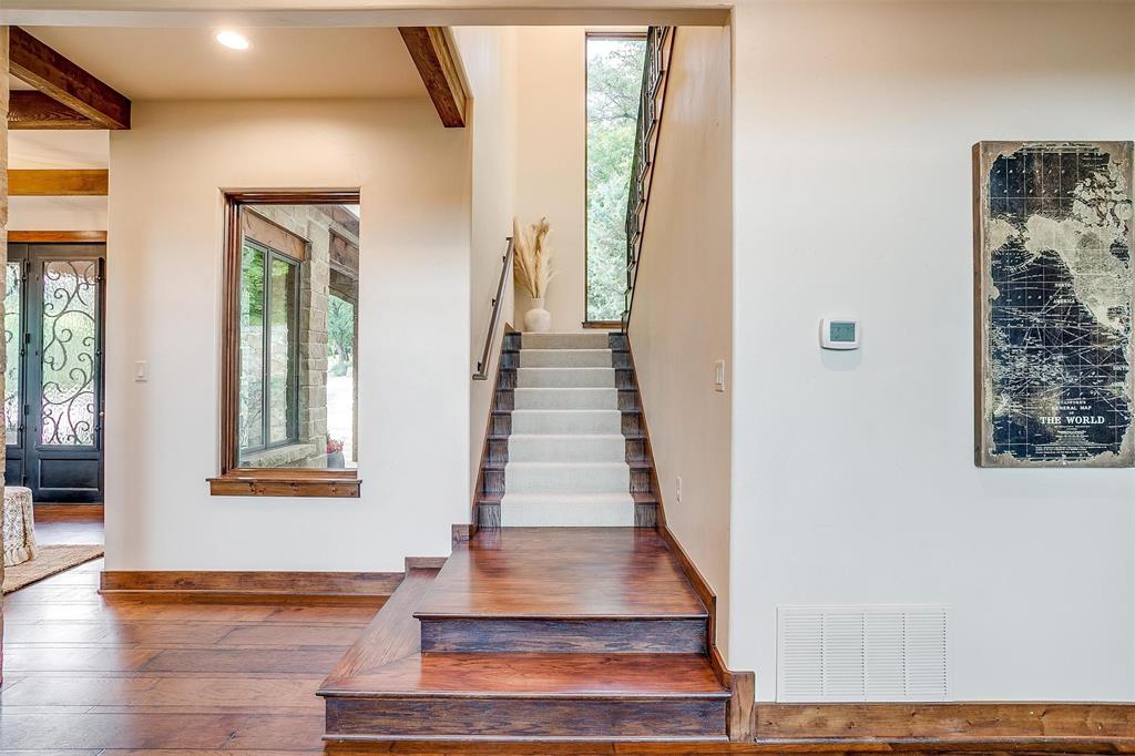 9930 Boat Club Road Fort Worth, TX 76179 - Photo 21 of 40 a view of an entryway with wooden floor and windows