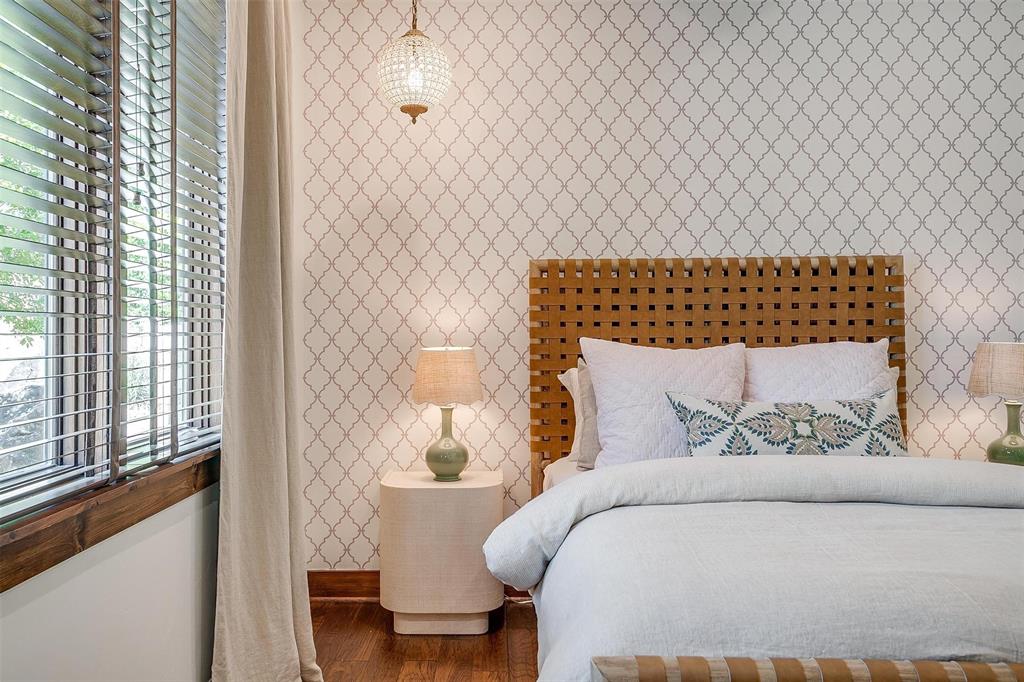 9930 Boat Club Road Fort Worth, TX 76179 - Photo 26 of 40 a bed sitting in a bedroom next to a window