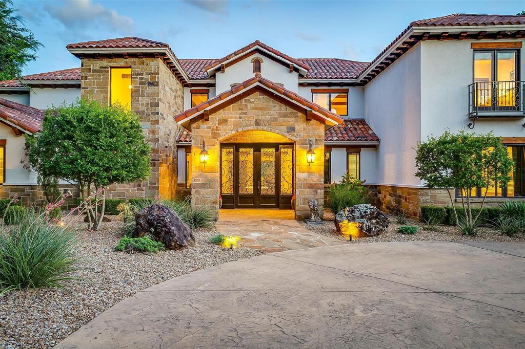 9930 Boat Club Road Fort Worth, TX 76179 - Photo 8 of 40 a front view of a house with a yard and potted plants