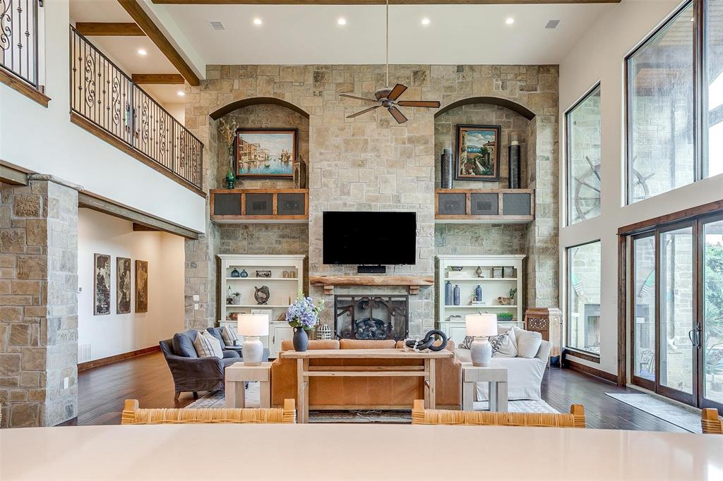 9930 Boat Club Road Fort Worth, TX 76179 - Photo 10 of 40 a living room with fireplace furniture and a flat screen tv