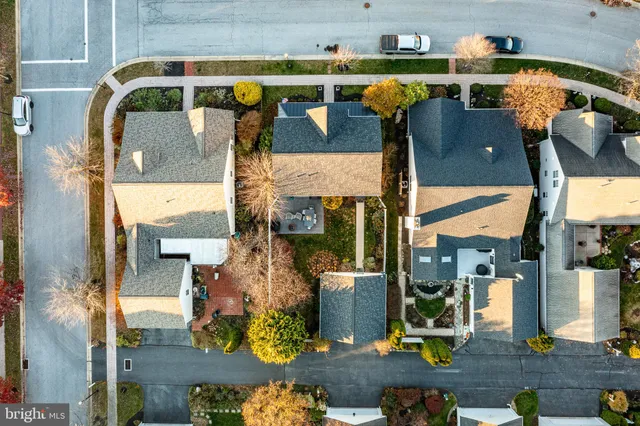 an aerial view of a house with a garden