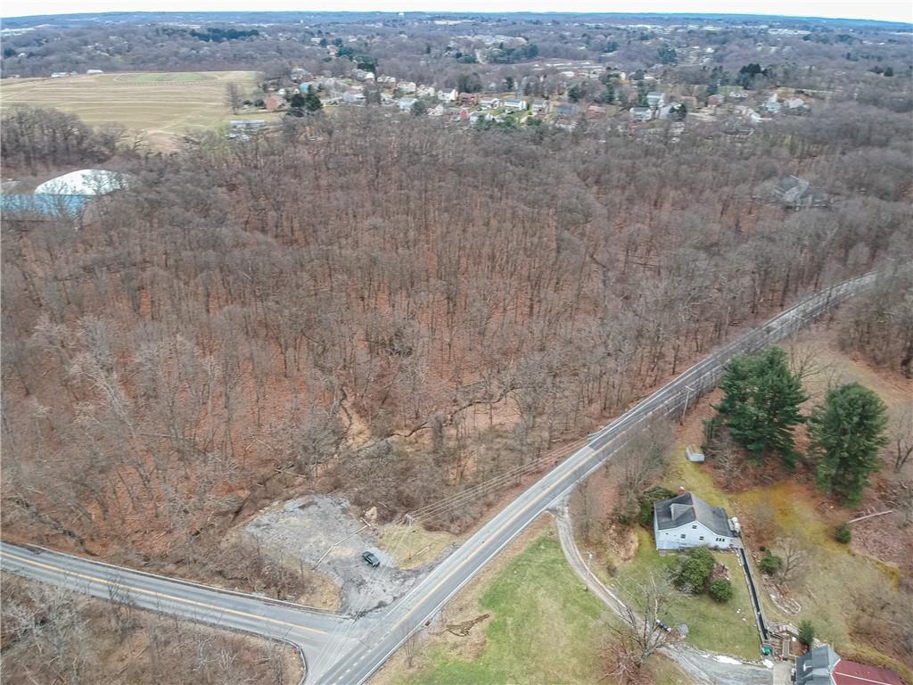 000 Mingo rd offers 16 acres of beautiful wooded land and streams. Perfect for your own quiet estate or subdivide into a few lots for some friends!