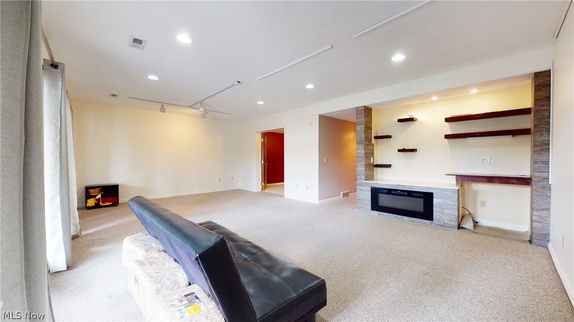 6962 Mill Road, Unit 2 Brecksville, OH 44141 - Photo 26 of 29 lower level entertainment area