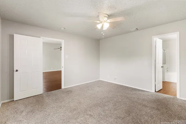 an empty room with an entryway