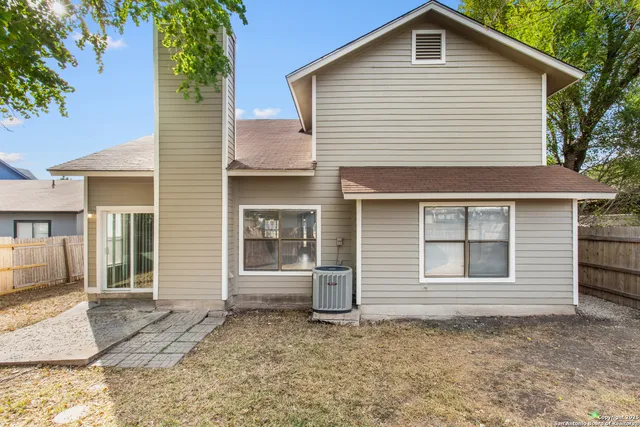 a front view of a house with a garage
