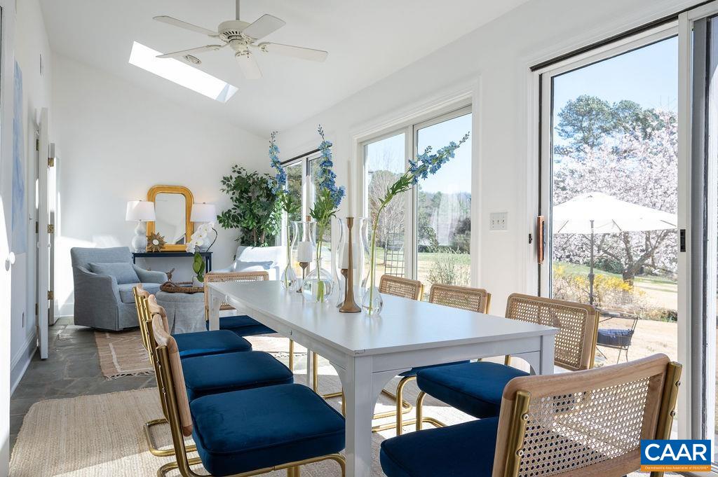 15 Orchard Road Charlottesville, VA 22903 - Photo 11 of 38 a view of a dining room with furniture wooden floor and a chandelier