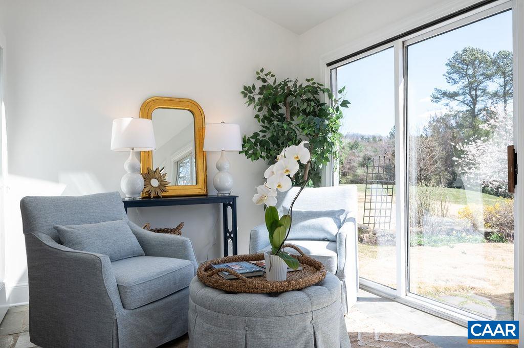 15 Orchard Road Charlottesville, VA 22903 - Photo 12 of 38 a living room with furniture and a potted plant