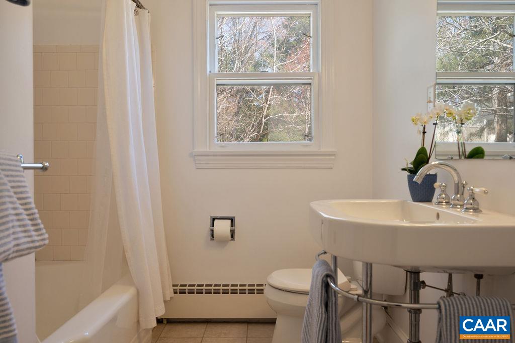 15 Orchard Road Charlottesville, VA 22903 - Photo 25 of 38 a bathroom with a sink toilet and shower