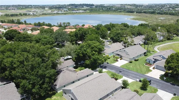 an aerial view of a house with a garden