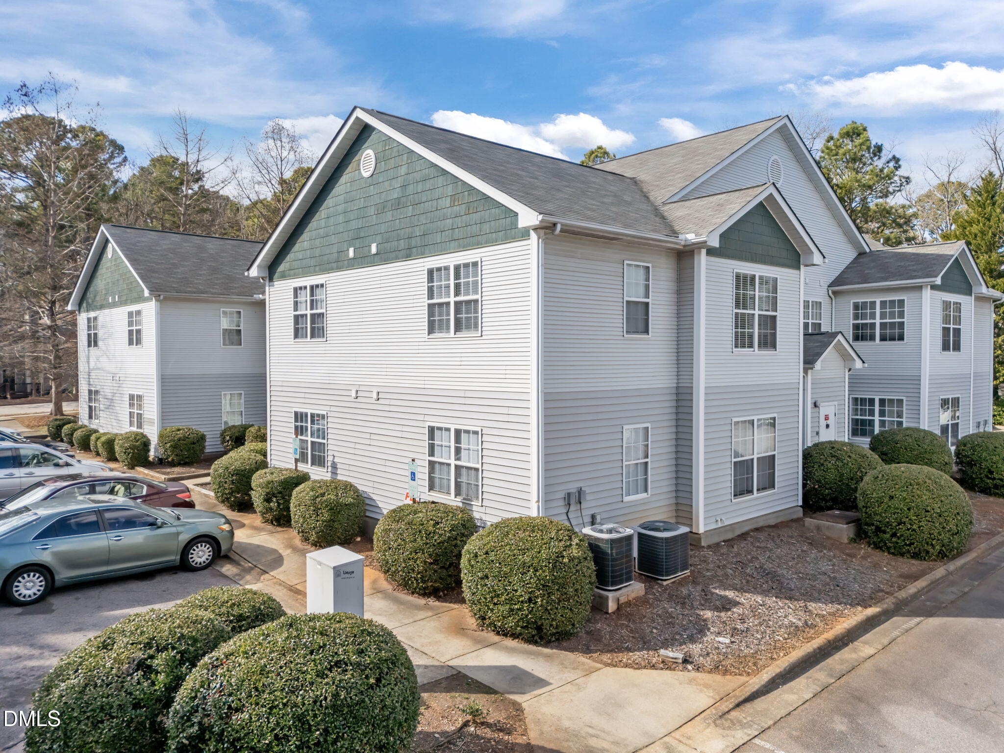 1305 Kent Road, Unit 101 Raleigh, NC 27606 - Photo 21 of 29 a view of multiple house with a yard
