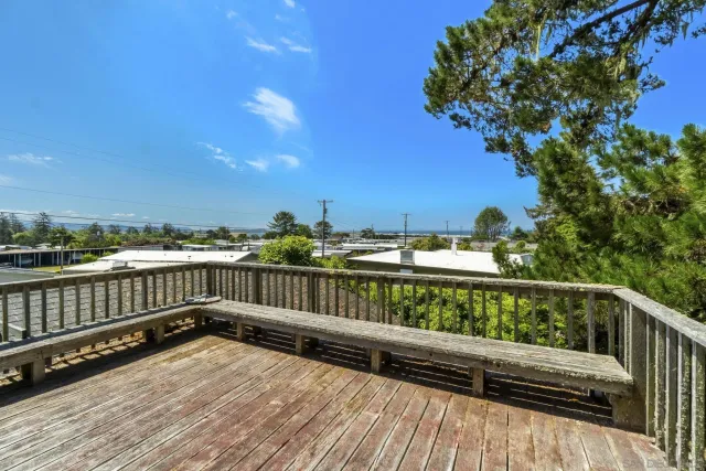 a view of balcony with furniture