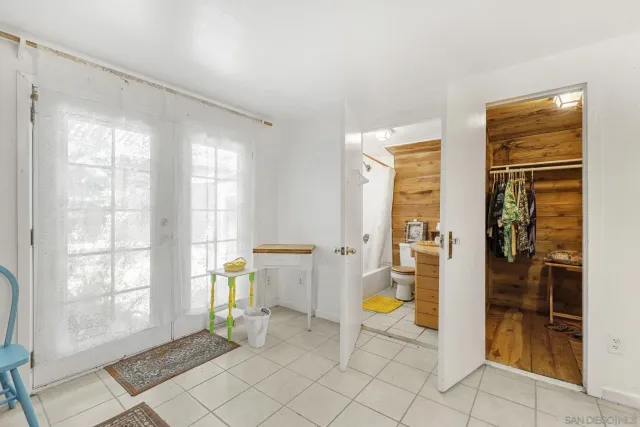 a view of a living room and dining room