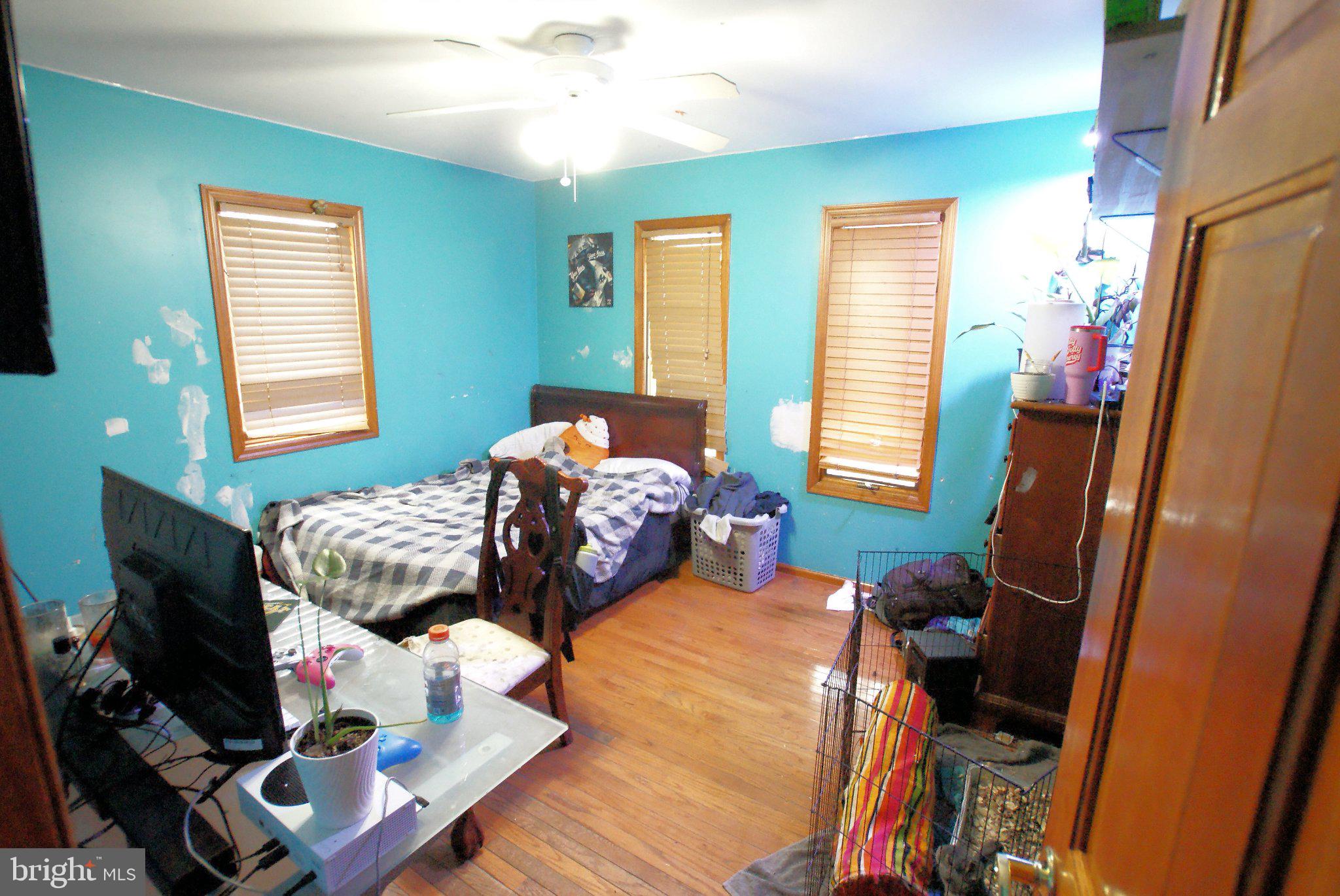 387 Frog Pond Road Little Egg Harbor, NJ 08087 - Photo 12 of 23 a bedroom with furniture and a window