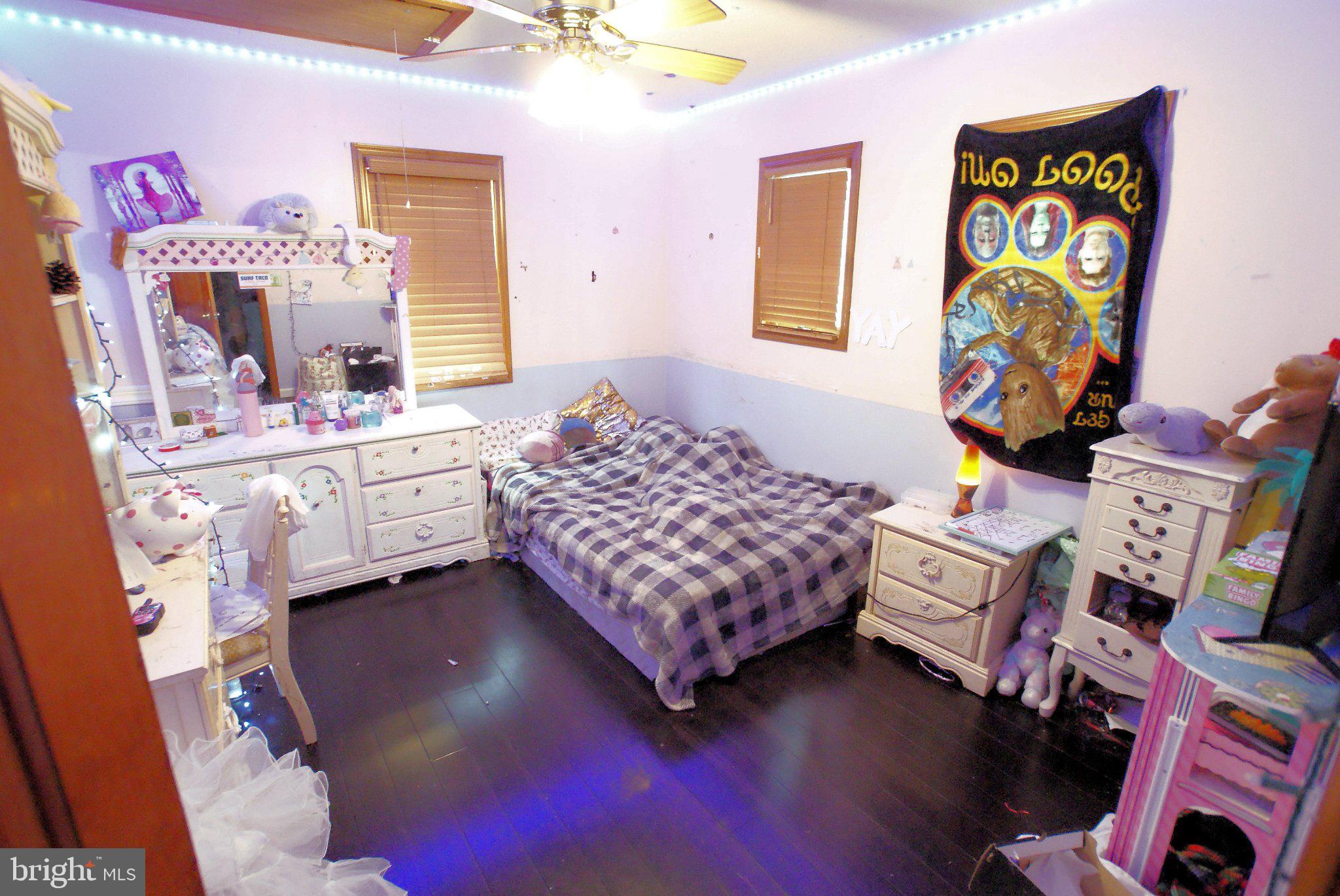 387 Frog Pond Road Little Egg Harbor, NJ 08087 - Photo 13 of 23 a bedroom with a bed and a window