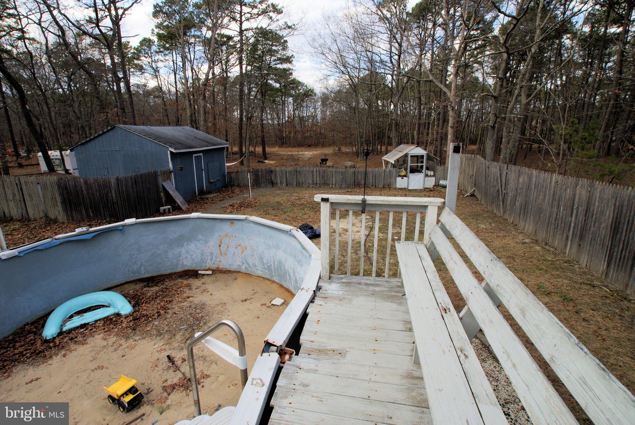 387 Frog Pond Road Little Egg Harbor, NJ 08087 - Photo 19 of 23 a view of a swimming pool with a patio