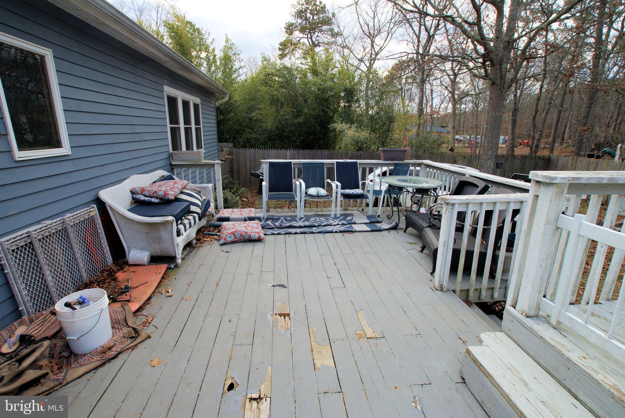 387 Frog Pond Road Little Egg Harbor, NJ 08087 - Photo 21 of 23 a balcony with wooden floor and barbeque oven