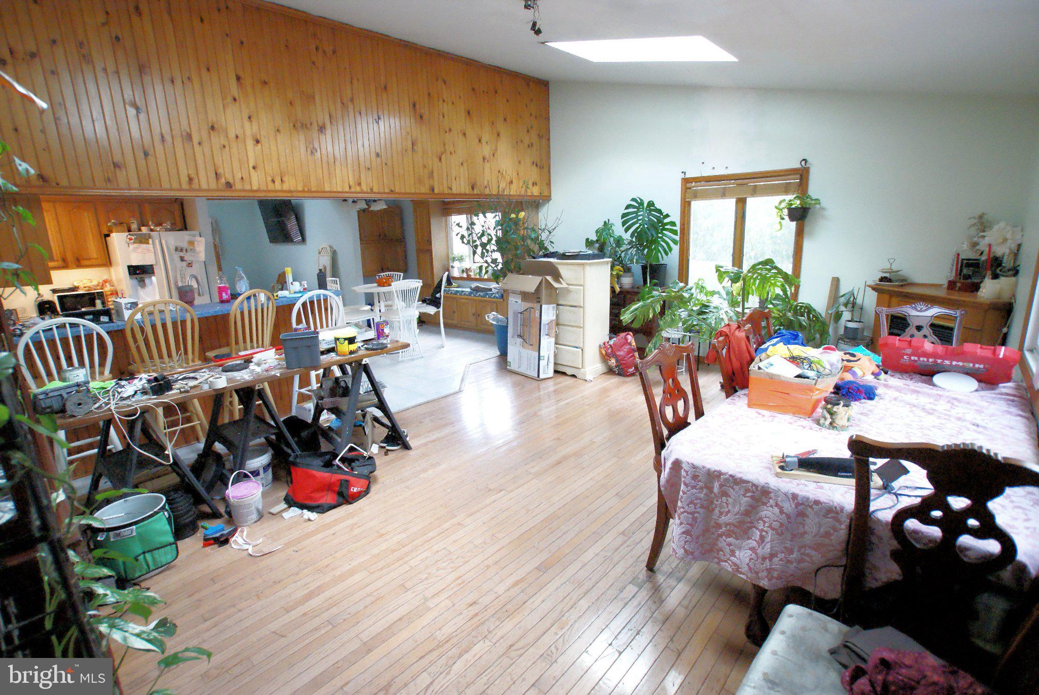 387 Frog Pond Road Little Egg Harbor, NJ 08087 - Photo 9 of 23 a view of a dining room with furniture window and outdoor kitchen