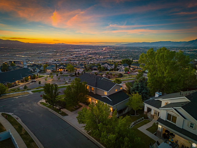 14883 Tooele Lane Draper, UT 84020 - Photo 40 of 49 Panoramic cityscape and mountain scenery under an expansive sunset sky