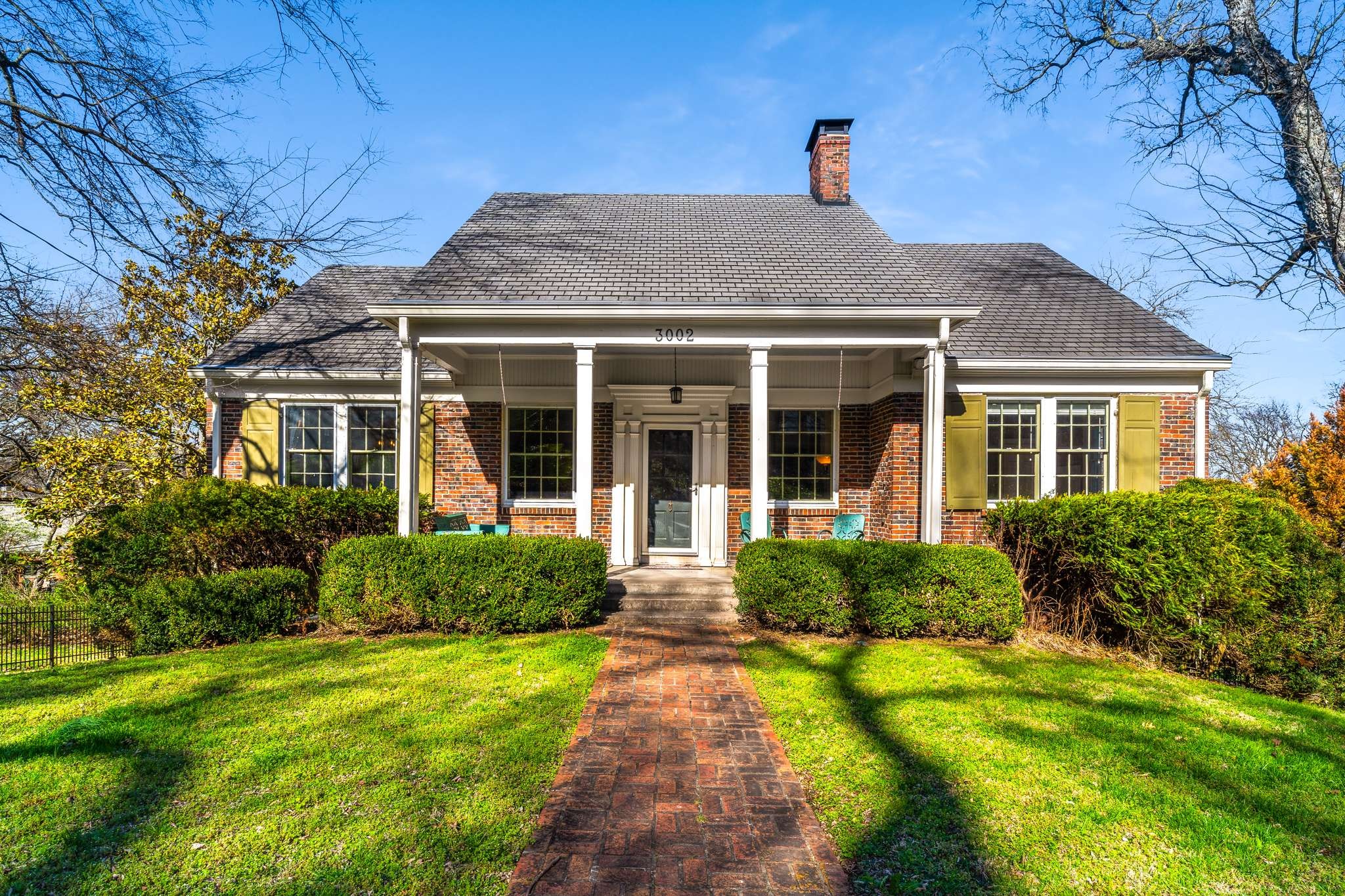 3002 Overlook Drive Nashville, TN 37212 - Photo 1 of 46 a front view of a house with garden
