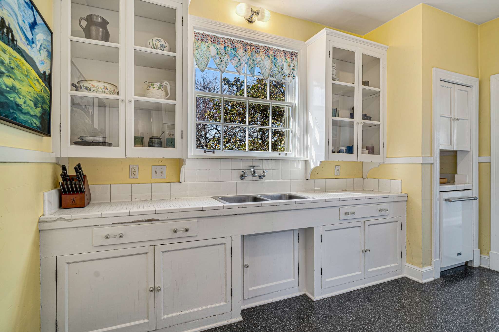 3002 Overlook Drive Nashville, TN 37212 - Photo 15 of 46 a kitchen with cabinets appliances and a sink
