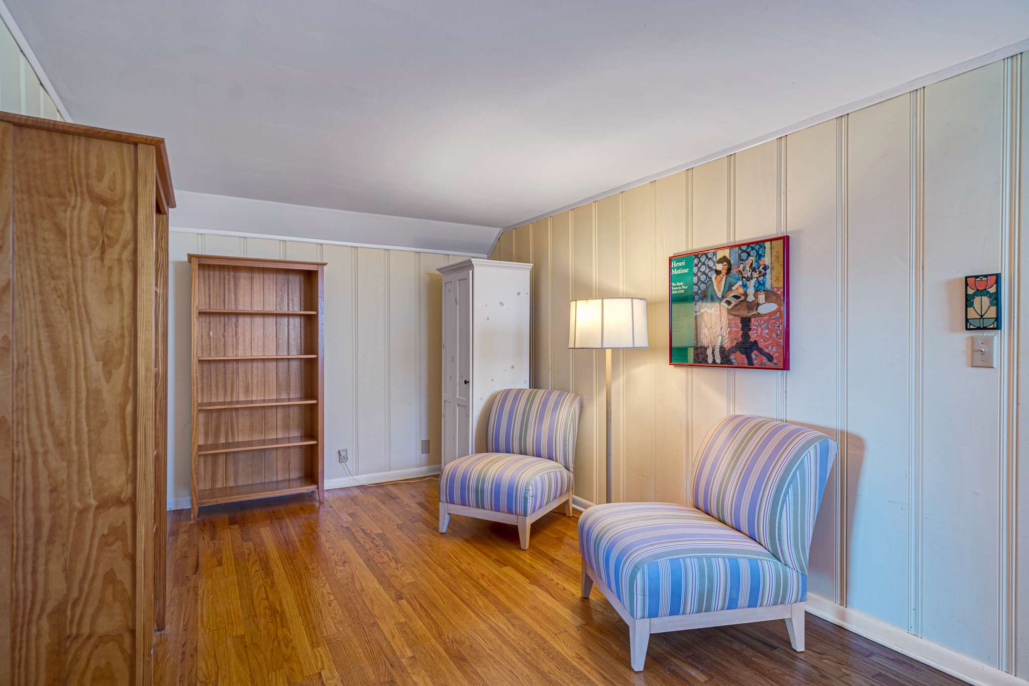 3002 Overlook Drive Nashville, TN 37212 - Photo 26 of 46 a bedroom with furniture and a wooden floor