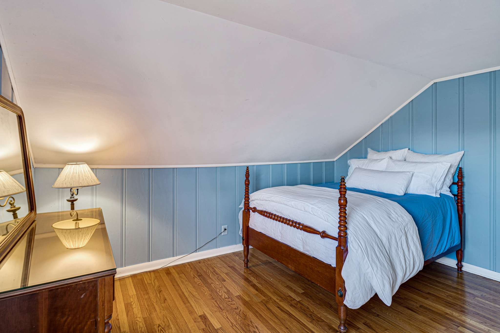 3002 Overlook Drive Nashville, TN 37212 - Photo 27 of 46 a bedroom with a bed and a flat screen tv