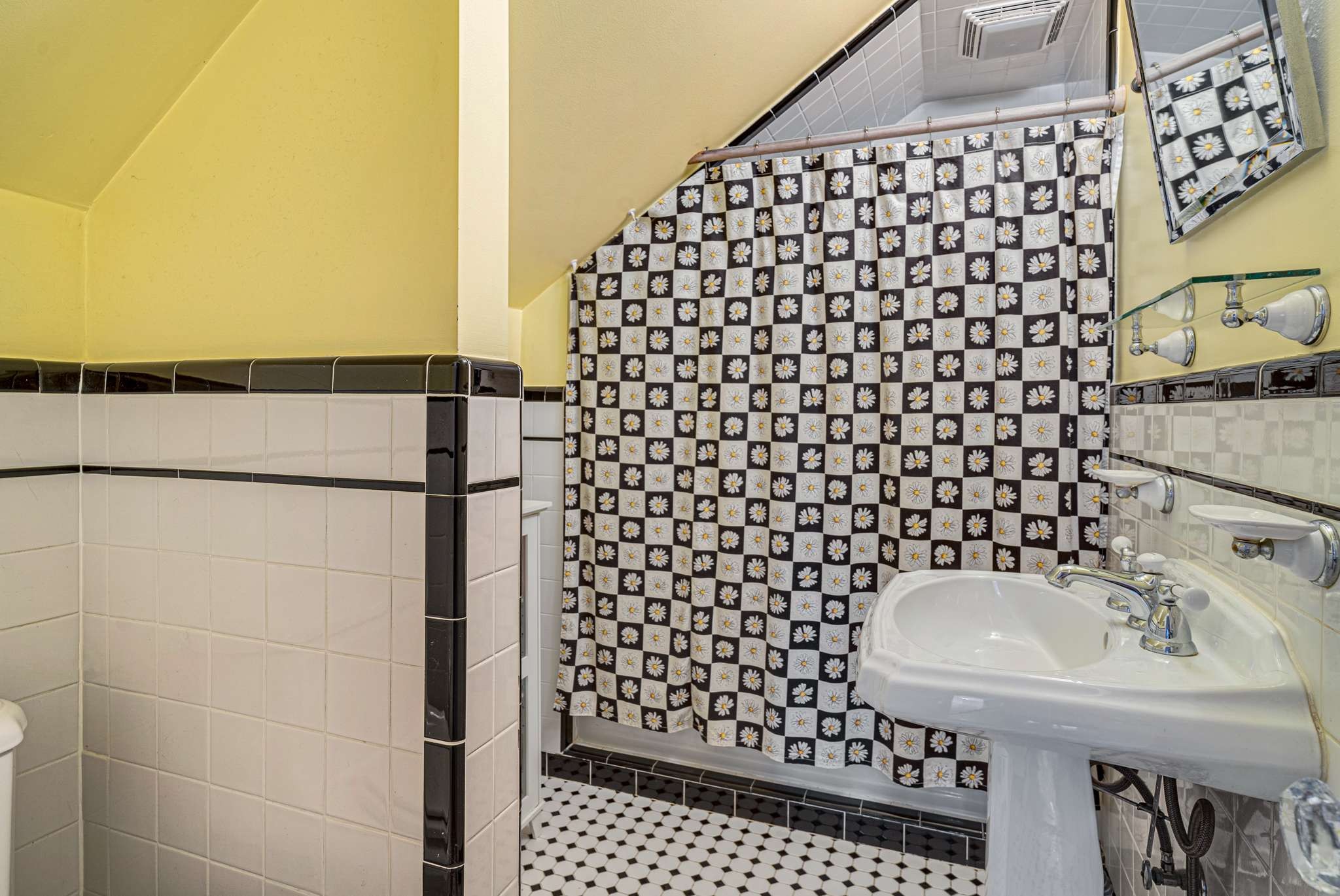 3002 Overlook Drive Nashville, TN 37212 - Photo 29 of 46 a bathroom with a sink a toilet and a mirror