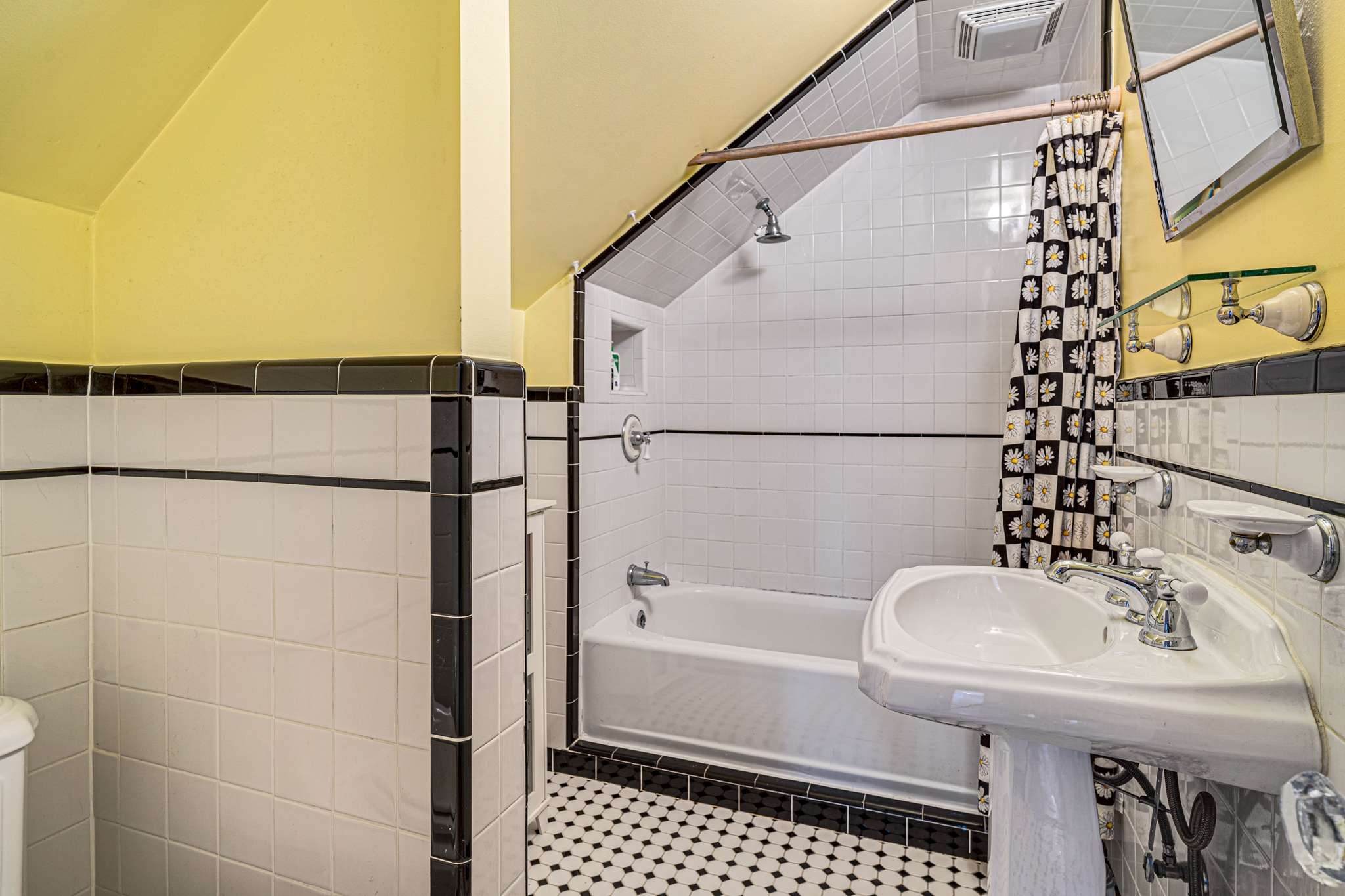 3002 Overlook Drive Nashville, TN 37212 - Photo 30 of 46 a bathroom with a sink a mirror and a shower