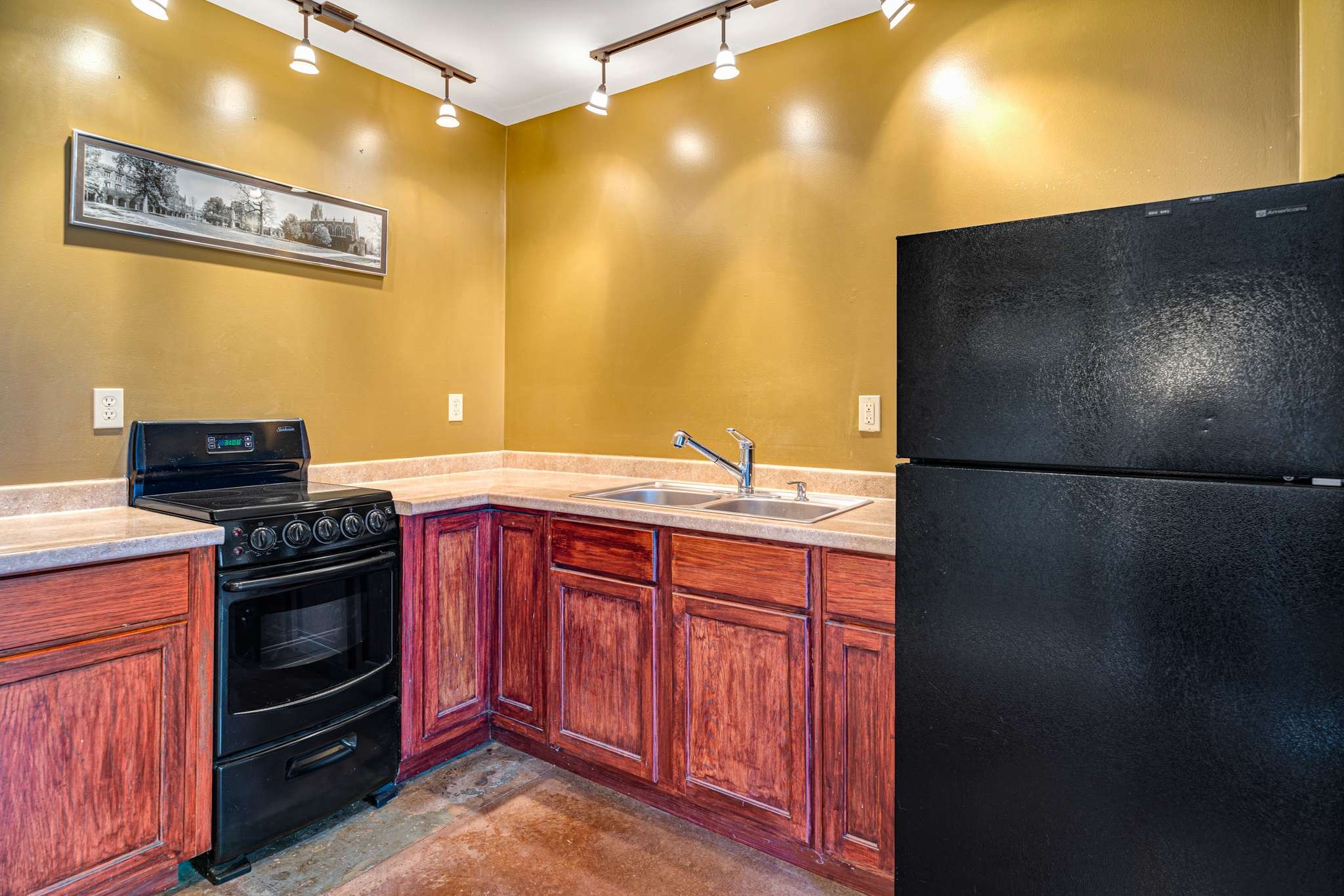 3002 Overlook Drive Nashville, TN 37212 - Photo 34 of 46 a kitchen with stainless steel appliances granite countertop a sink and a stove