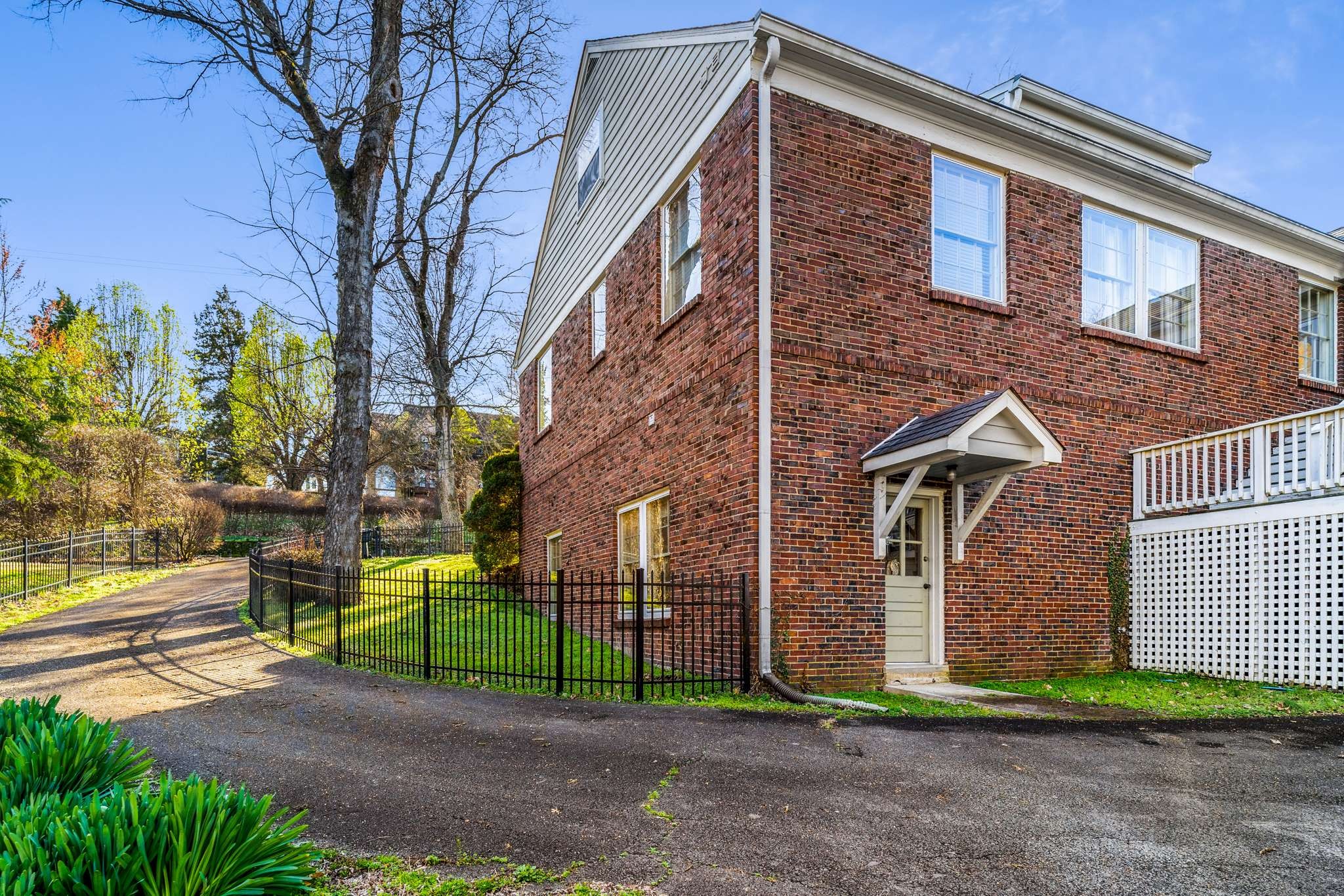 3002 Overlook Drive Nashville, TN 37212 - Photo 45 of 46 a front view of a house with a garden and trees