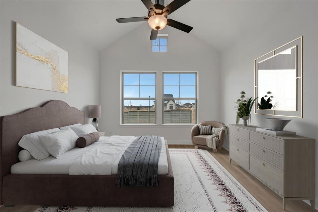8712 Chestnut Lane Justin, TX 76247 - Photo 19 of 29 Bedroom with lofted ceiling, a ceiling fan, and wood finished floors